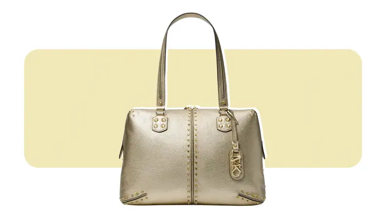 A gold zip-top tote bag.