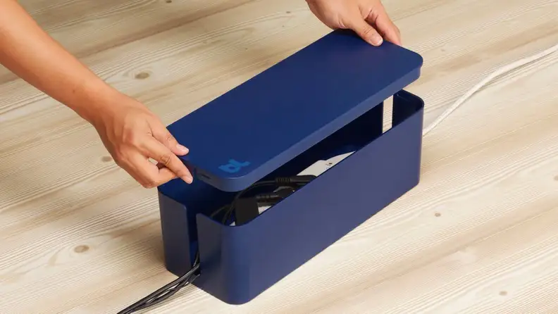 A cable organization box from Bluelounge