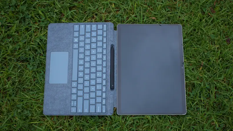 An overhead view of the Surface Pro X with the Type Cover attached.