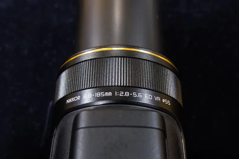 The focus ring on the DL24-500 (and indeed the other DL cameras) can't be reassigned to another function.