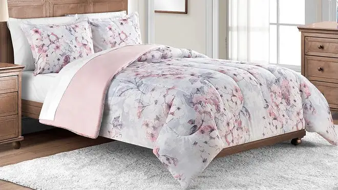 Pink and purple flowered comforter