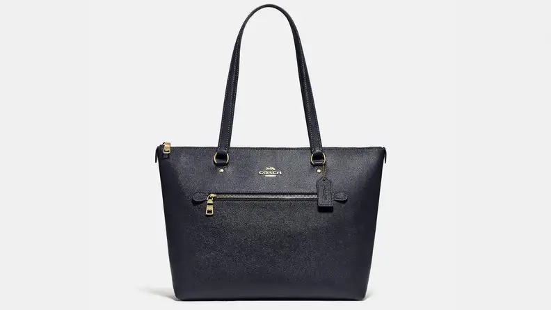 Black leather top handle coach tote bag.