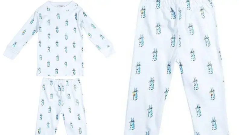 Hand-painted tiny blue bunnies on a set of white pajamas.