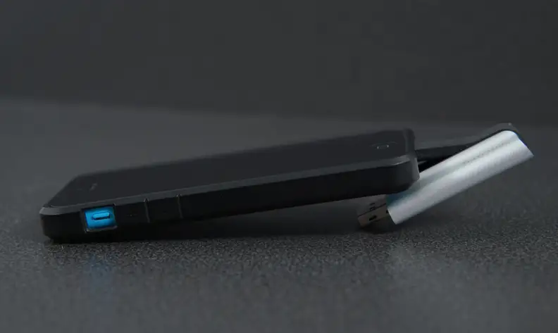 The SanDisk iXpand is a little awkward to use when it's plugged in.