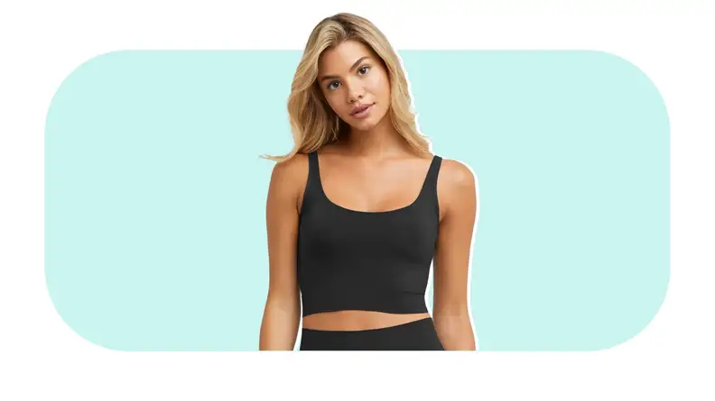 Model showcasing a black Maidenform M Smoothing Seamless Cropped Cami.