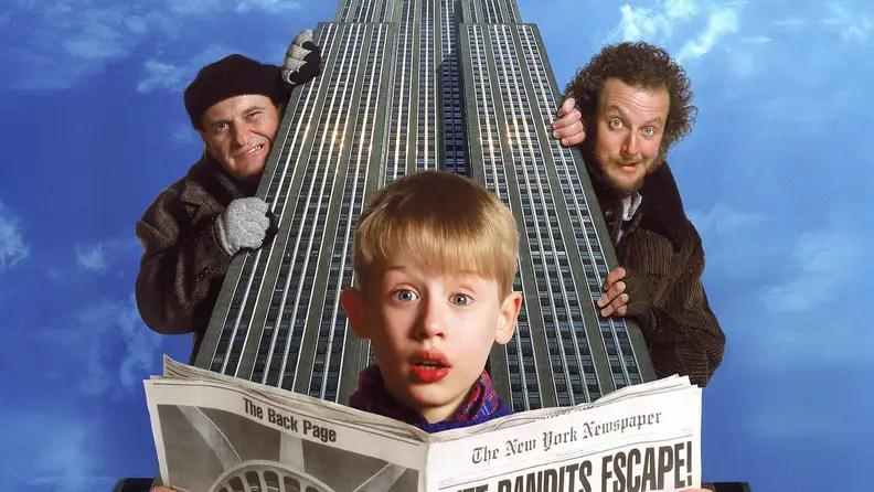 Joe Pesci, Daniel Stern, and Macauley Culkin on the poster for Home Alone 2: Lost in New York.