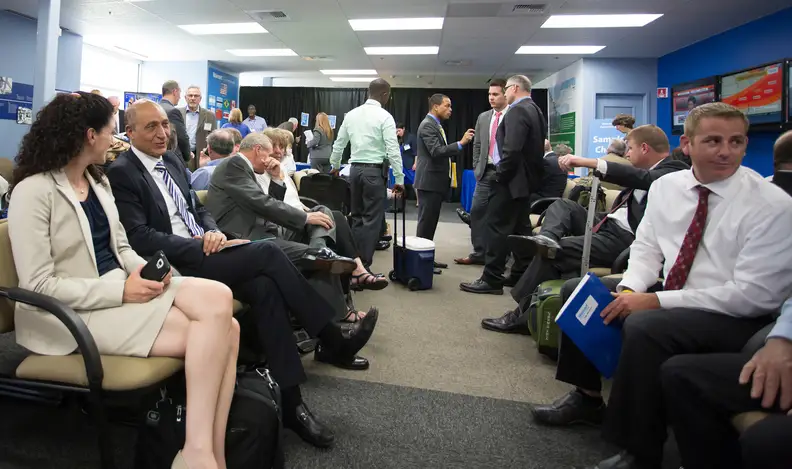 Potential Walmart suppliers gather at the company's Bentonville, Arkansas, home office before the supplier meeting.