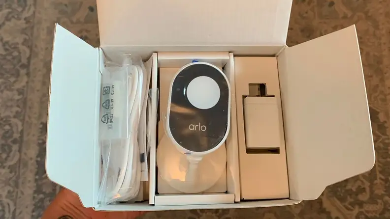 The Arlo Essential Indoor Security Camera packaging.