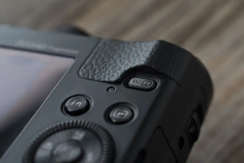 A picture of the Panasonic Lumix ZS40's WiFi button.