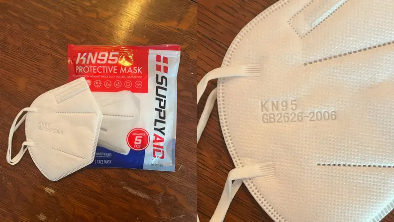 An image of the Supply Aid KN95 face mask lying on its packaging.