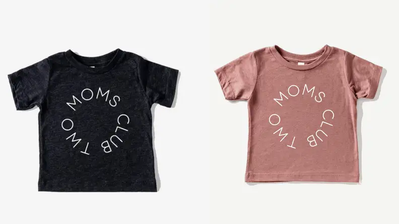 On left, black and white graphic tee that reads, "Two moms club." On left, coral and white graphic tee that reads, "Two moms club."