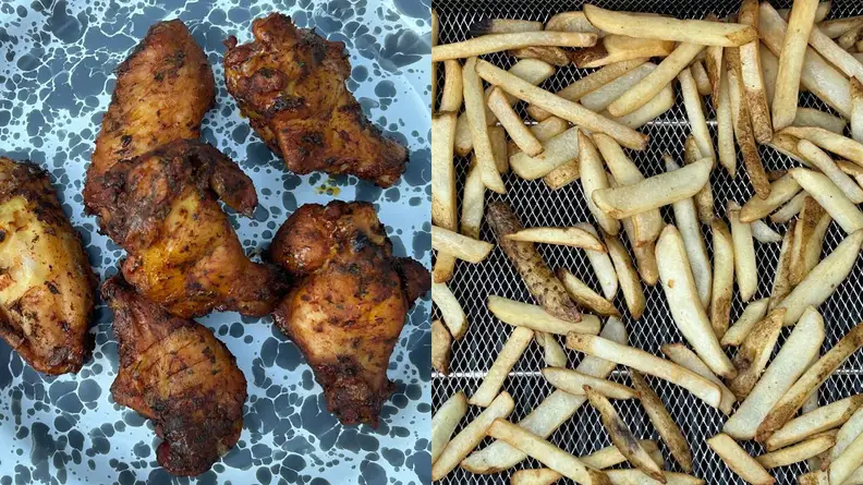 On right, six cooked and browned chicken breasts sitting on top of white surface. On right, cooked french fries sitting on top of cooling rack.