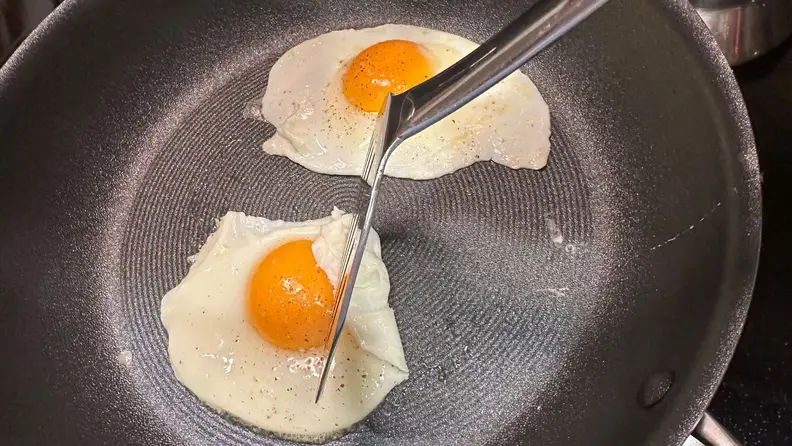 Two over-easy eggs on the Circulon ScratchDefense Nonstick Frying Pan.
