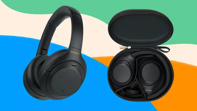Navy blue over ear headphone with case.
