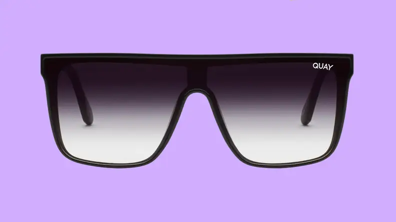 An image of a pair of shield sunglasses in black with black-to-gray lenses.
