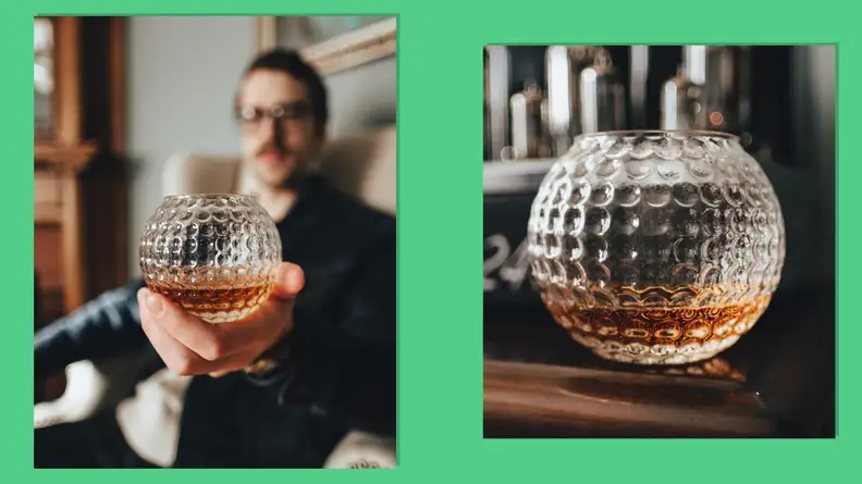 Man holding a Golf ball whiskey glass next to a product photo of the glass on a green backround.