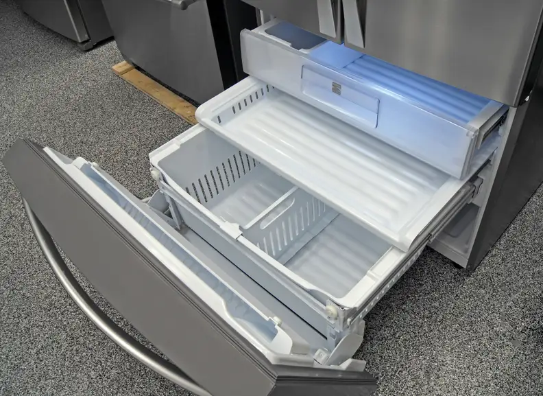 The Kenmore Elite 74025's tilt-down door makes it easy to access the freezer drawers, as long as you have the kitchen space for a full extension.