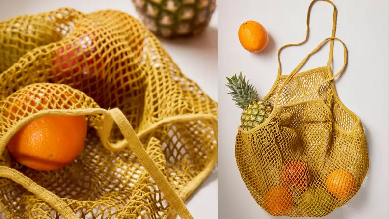 Market bag with oranges.