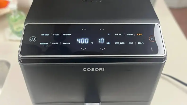 Close up view of the settings touch panel on the Cosori Dual Blaze Air Fryer.