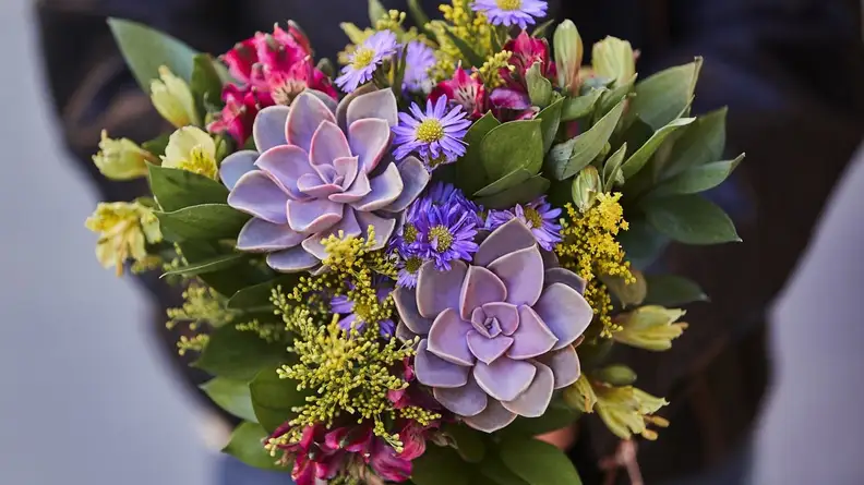 These fun Farmer's Market bouquets include a mix of fresh flowers.