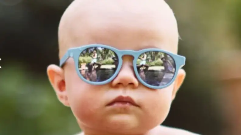A baby with polarized sunglasses.