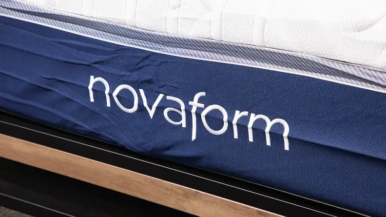 Close up of a Novaform foam mattress' side panel showing its logo.