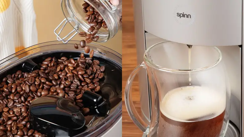 A person deposits coffee beans into a grinder on a coffee maker.