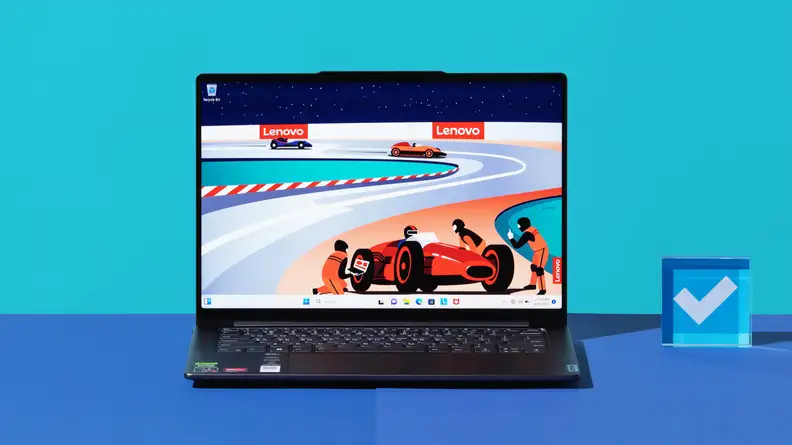 An open and powered on laptop showing a red race car on its screen against a blue backdrop.