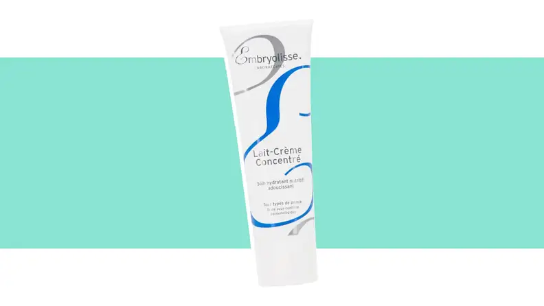 A tube of skin lotion against a green background.