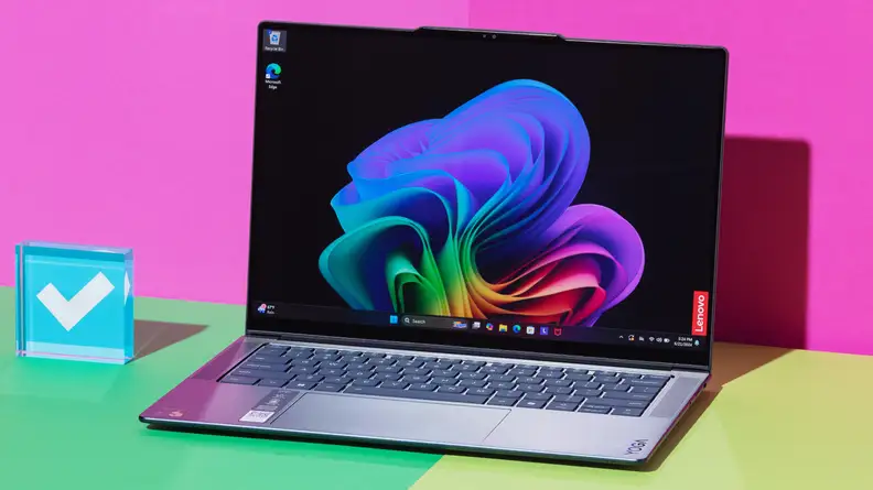 Lenovo Yoga Slim 7x on a teal and pink background.
