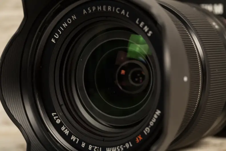 The massive front element is necessary to get the constant f/2.8 aperture, but it also unbalances the lens at full telephoto.