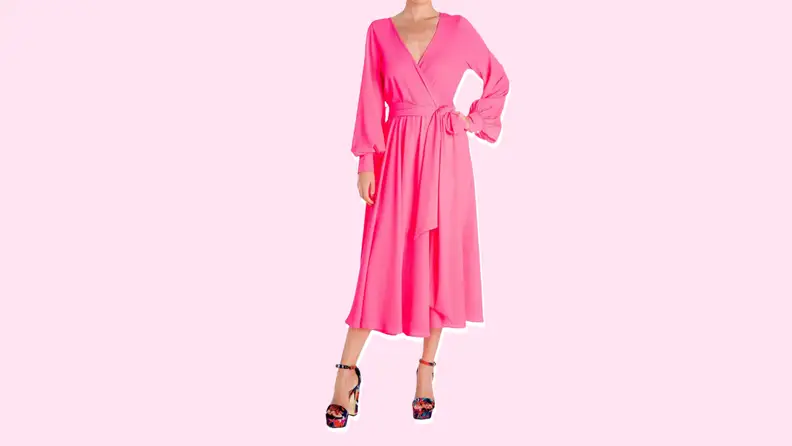 A pink midi dress from Meghan Los Angeles against a light pink background.