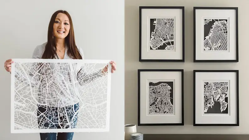 Left: person holding up hand cut map