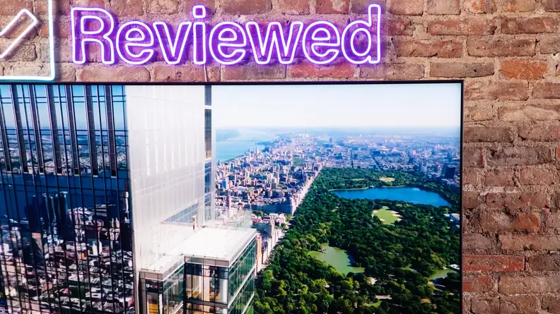 The Samsung TV displaying an aerial shot of New York City.