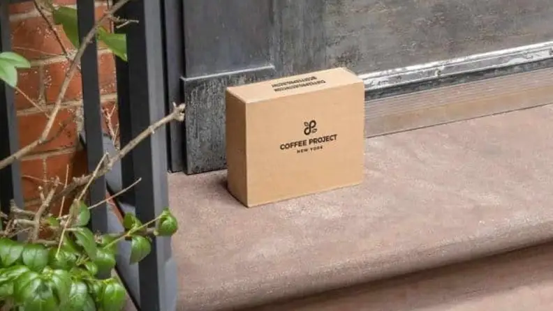 Coffee Project New York cardboard box on a doorstep