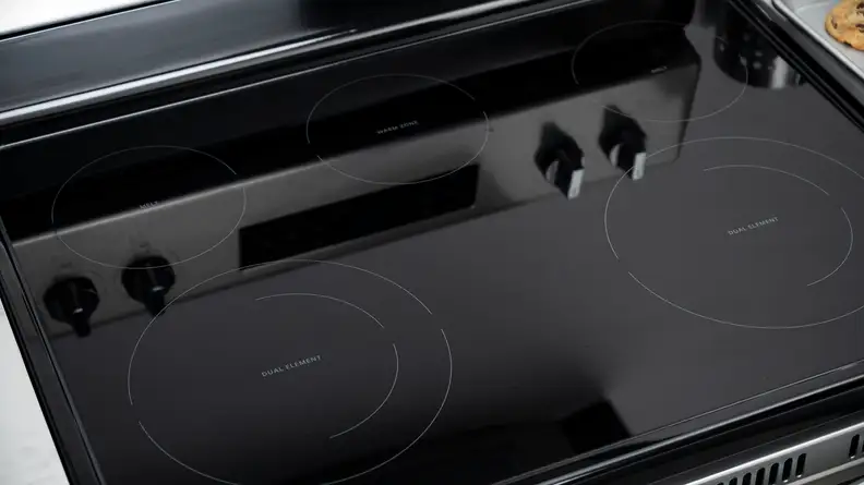 The cooktop on the Whirlpool WFE535S0JZ electric range has four burners and one warming zone.