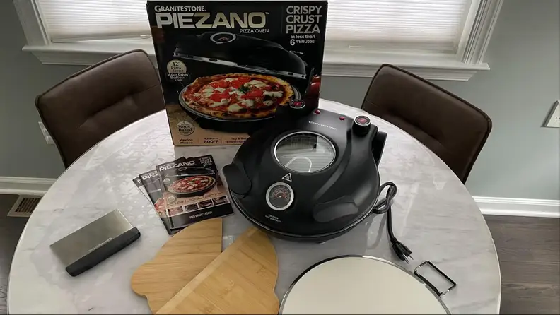 The oven and its contents spread out on a table.