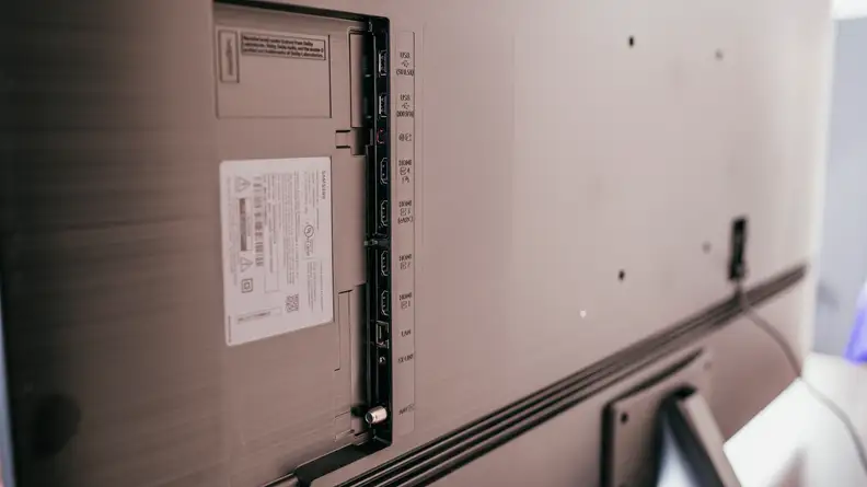 The Samsung QN85A's connectivity options, as seen from behind the TV's panel