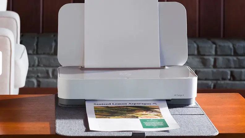 HP printer on table printing picture