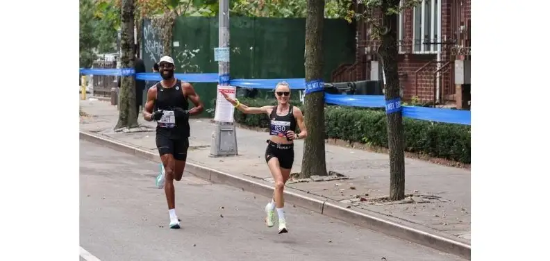 Matt James running a race wearing the Nike Vaporfly sneakers