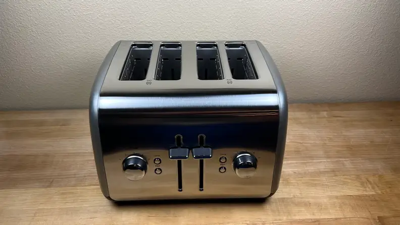 KitchenAid 4-slice toaster on wooden surface