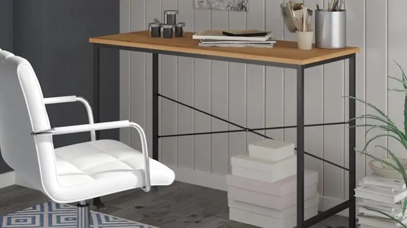 This plain desk has a narrow profile.