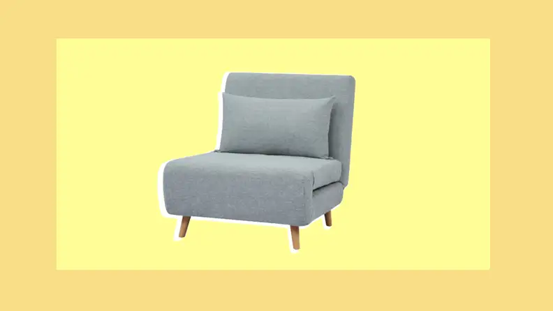 Blue, linen convertible chair that can be placed in a dorm room.