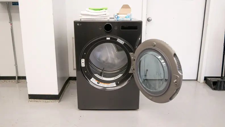 The LG DLEX6700B Dryer with its door open.