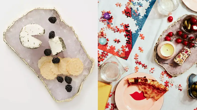 Rose quartz cheeseboard and a cheeseboard in use with a half-finished puzzle, among the best things to buy at Anthropologie.