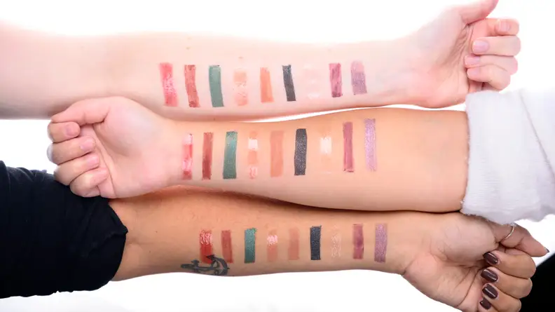 Color swatches of Haus Labs makeup comparing how it looks on different skin tones