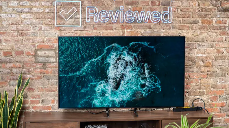 The Samsung Q70A displaying 4K/HDR content in a living room setting