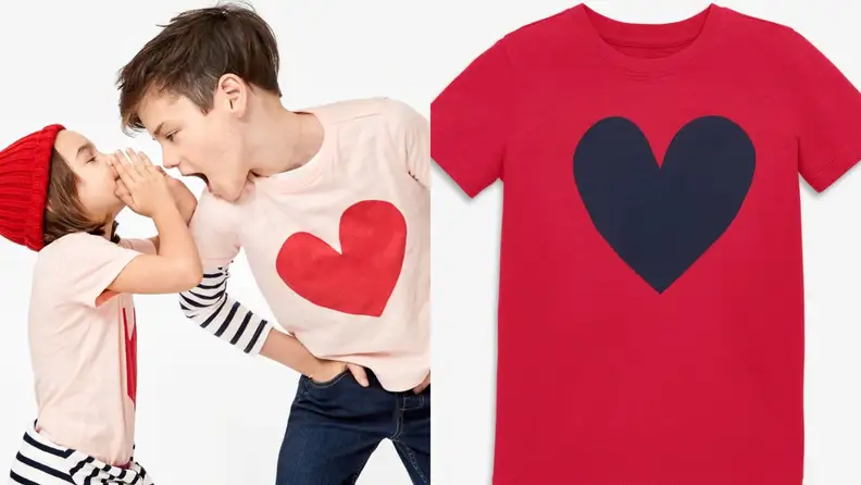 On left, children playing together while wearing heart-printed shirt. On right, red children's t-shirt with navy heart printed on front.