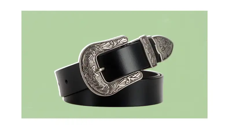 A belt with a large, western-style buckle.