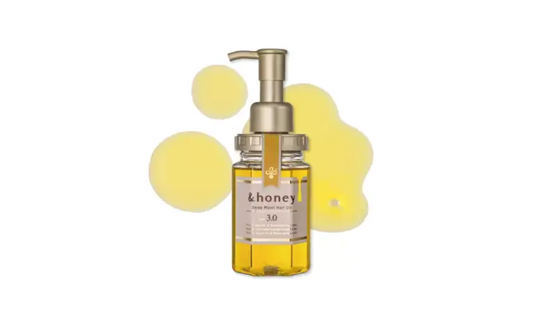 a container of hair oil